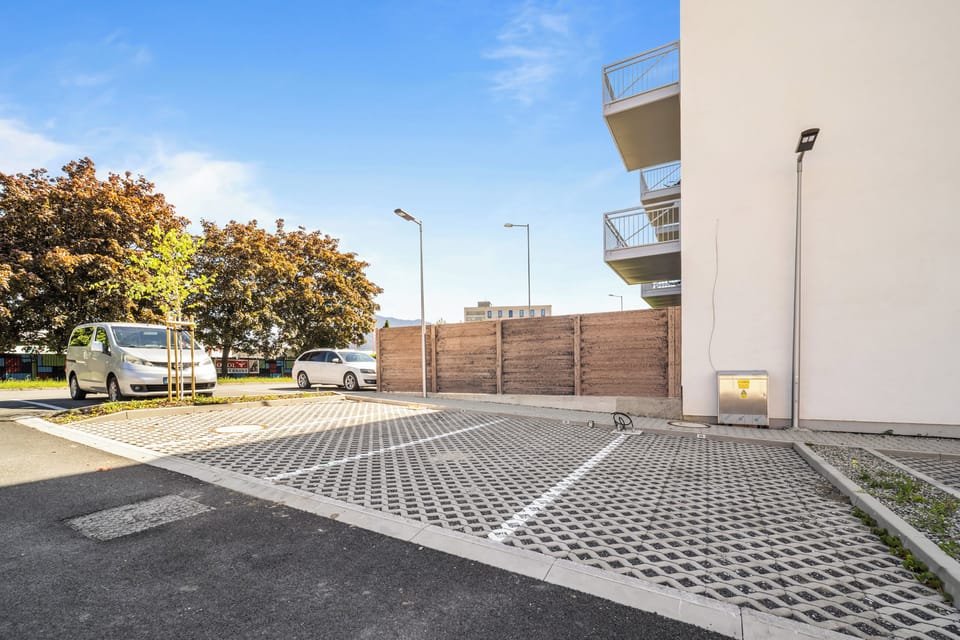 Convenient on-site parking beside the building with easy access