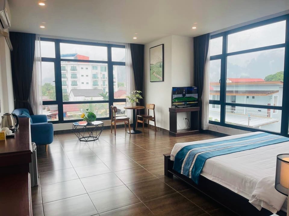 Deluxe Double Room, Mountain View | Hypo-allergenic bedding available, pillowtop beds, in-room safe, desk