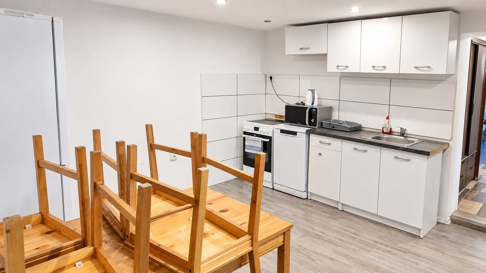 Bright kitchen with dining area and essentials for easy, comfortable stays