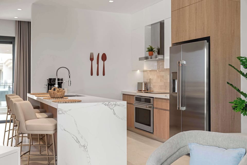 From coffee to cooking, this kitchen keeps the essentials close and the space uncluttered