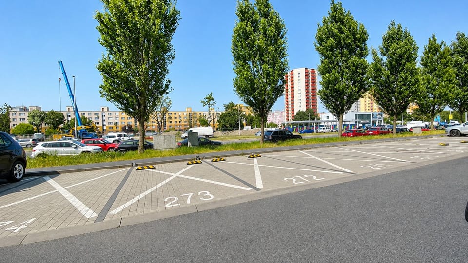 Convenient outdoor parking with clearly marked spaces and easy access