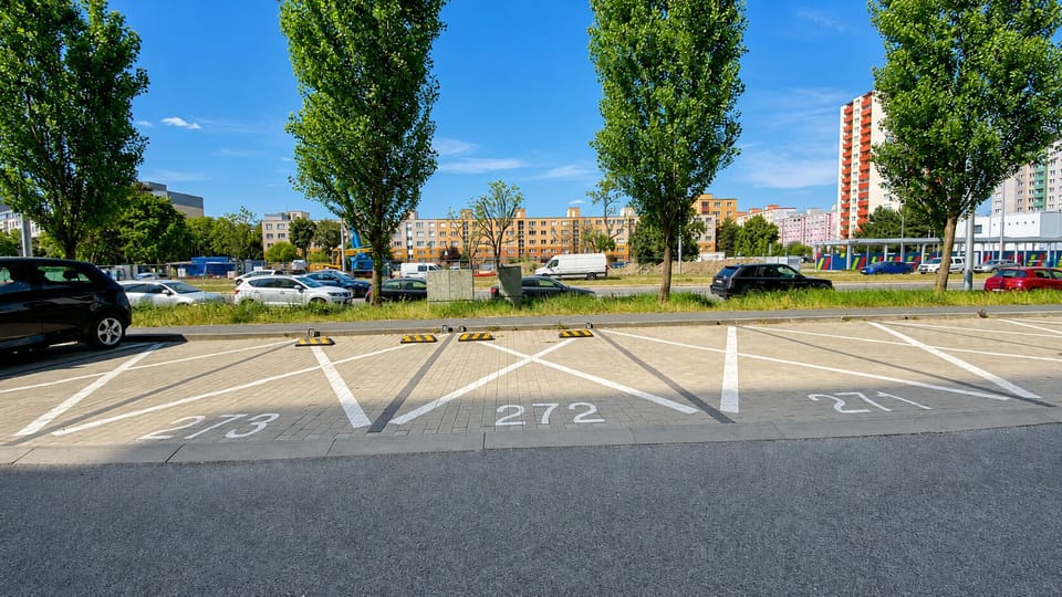 Convenient on-site parking in a bright, tree-lined urban setting