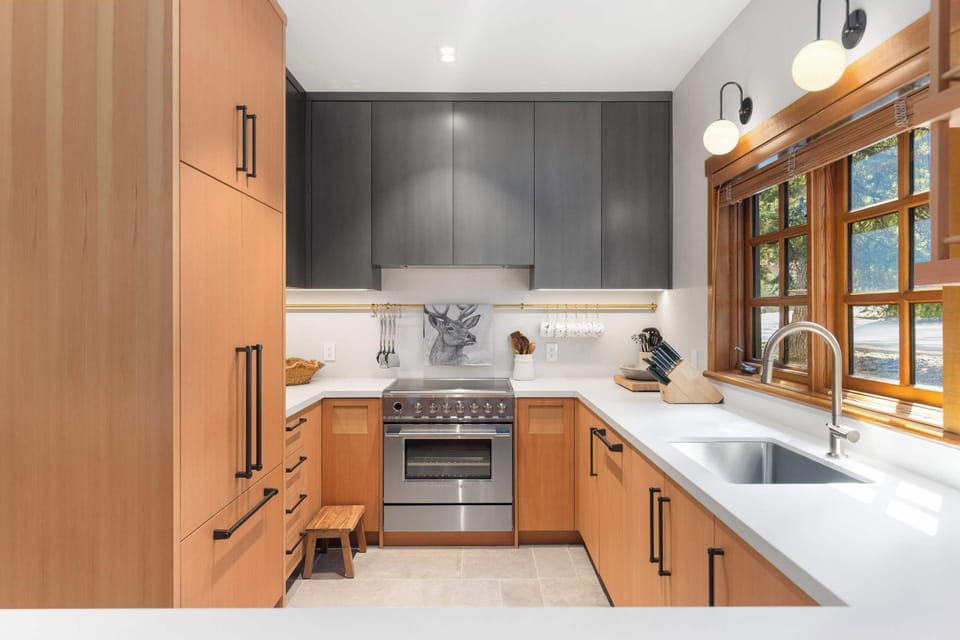 
- Modern kitchen with stainless steel appliances - Sleek design and full amenities for gourmet mountain meals - Bright space ideal for cooking after a day of adventure