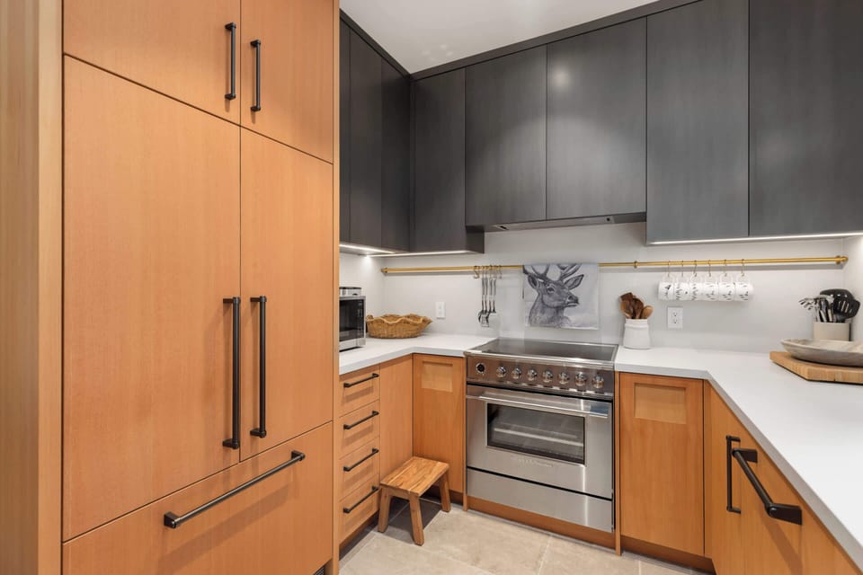 
- Modern kitchen with stainless steel appliances - Sleek design and full amenities for gourmet mountain meals - Bright space ideal for cooking after a day of adventure