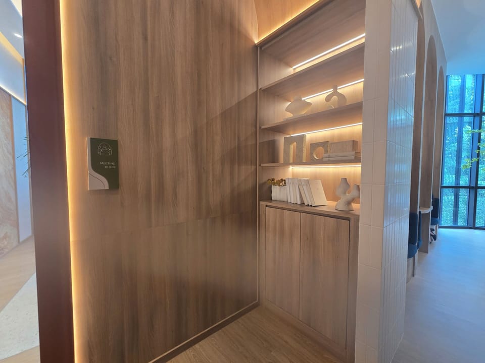 Warm wood interiors with designer lighting and boutique-style built-ins