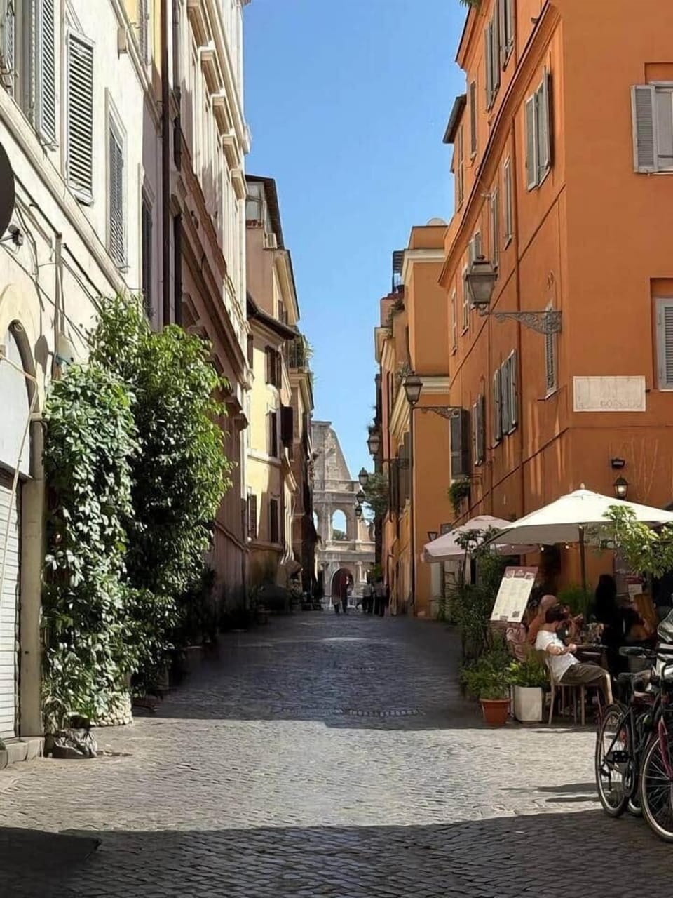 Outdoor tables in a Monti alley