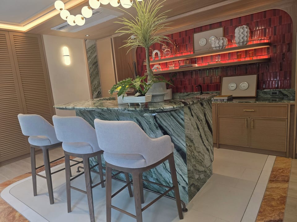 Elegant marble bar with designer lighting and chic lounge vibes