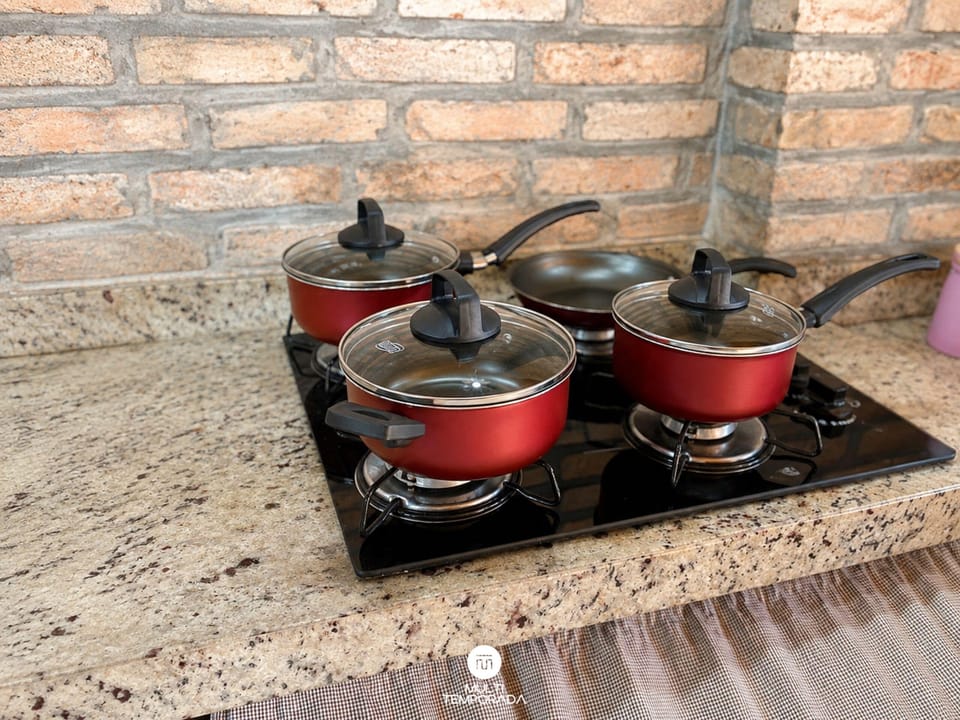 Family Cabin, 1 Bedroom, Fireplace, Lagoon View | Private kitchen | Fridge, microwave, cookware/dishes/utensils, dining table