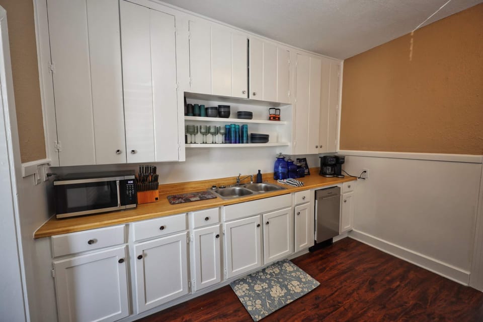 A practical kitchen and laundry space for a comfortable stay