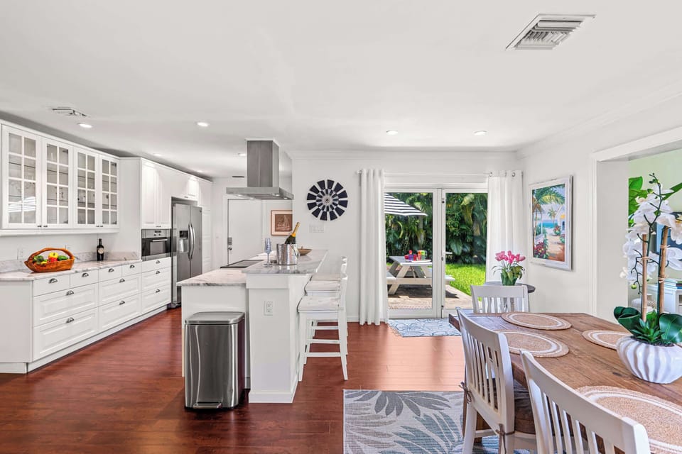 The kitchen has easy access to the didning room