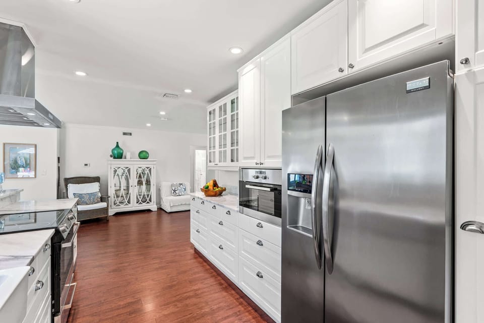 The kitchen has a large oversized refridgerator