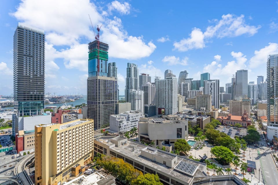 Living at the center of it all! This stunning high-rise view captures the vibrant energy of the city skyline and waterfront. Experience ultimate urban luxury with a front-row seat to breathtaking sunsets and city lights.
