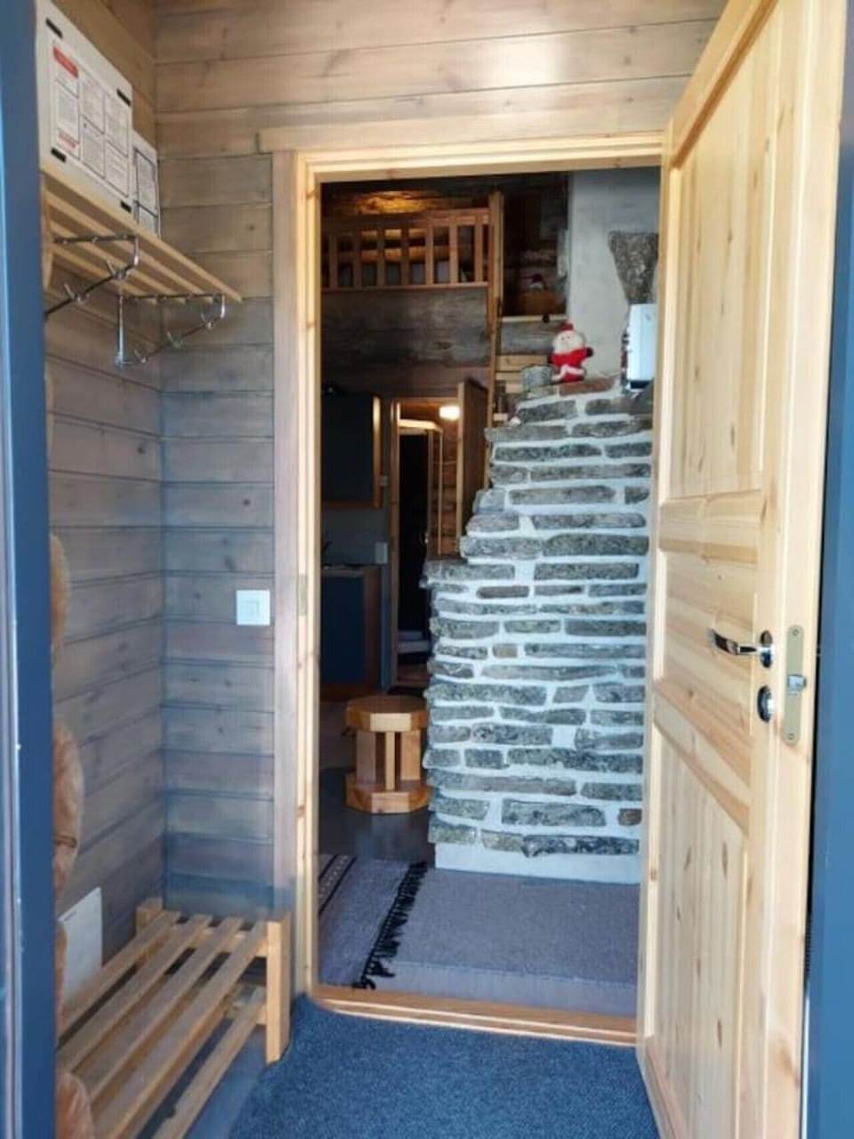 Wooden staircase leading up to the loft.