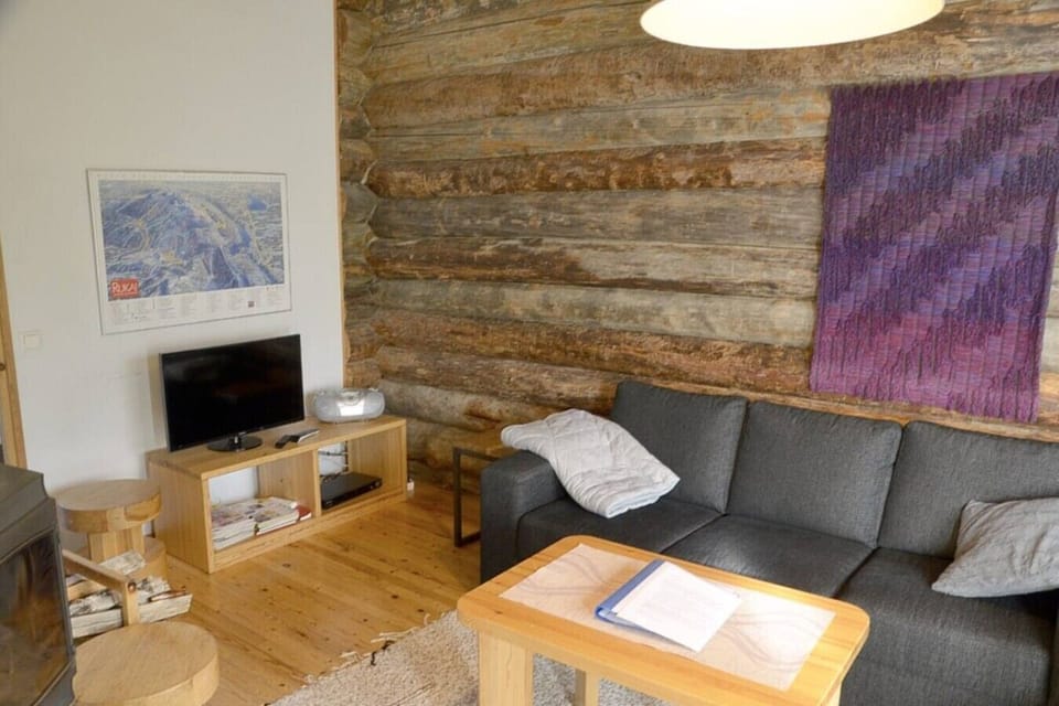 Living room with television and seating