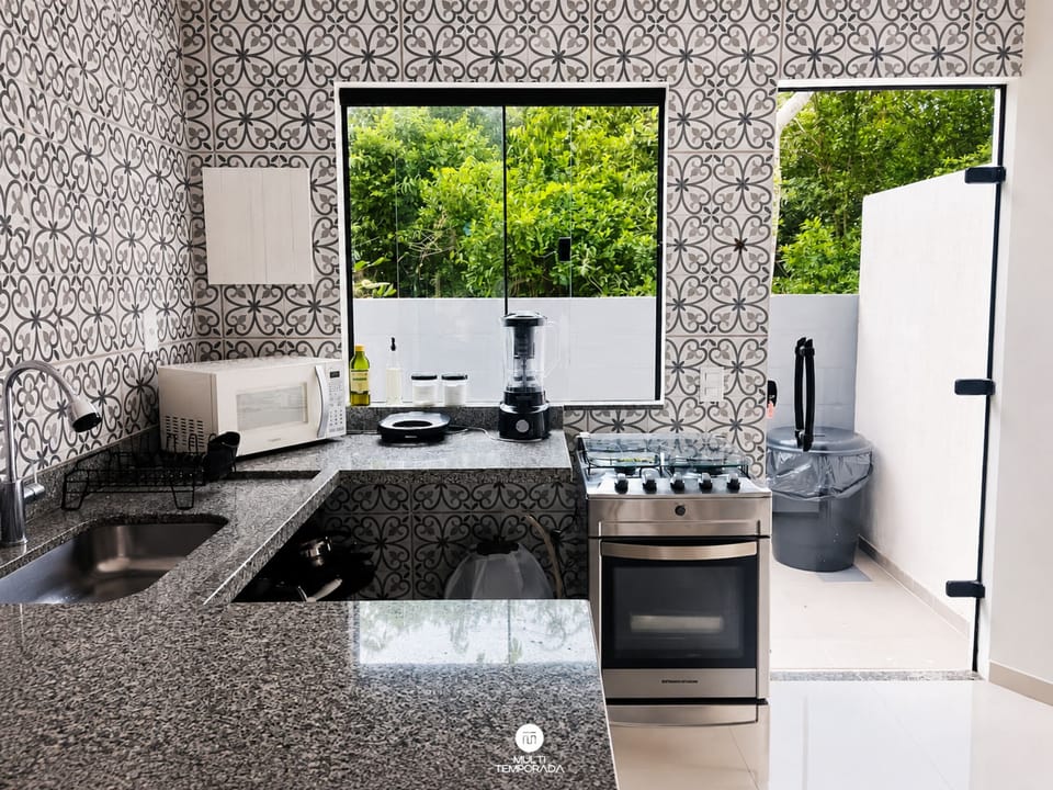 House, 2 Bedrooms, Air conditioning, Garden View | Private kitchen | Full-size fridge, microwave, cookware/dishes/utensils, dining table