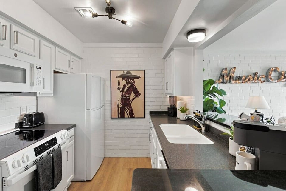 Fully equipped kitchen for all of your cooking needs! Kitchen island has seating for two.