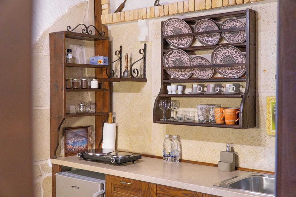 Triple Room, Sea View | Private kitchen | Fridge, stovetop, coffee/tea maker, electric kettle
