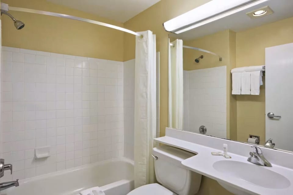 Hair dryer, towels, soap, shampoo
