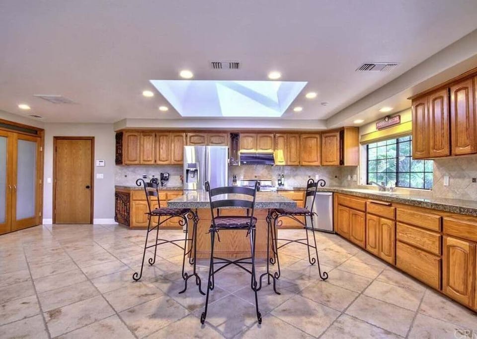 Fully stocked chef's kitchen.