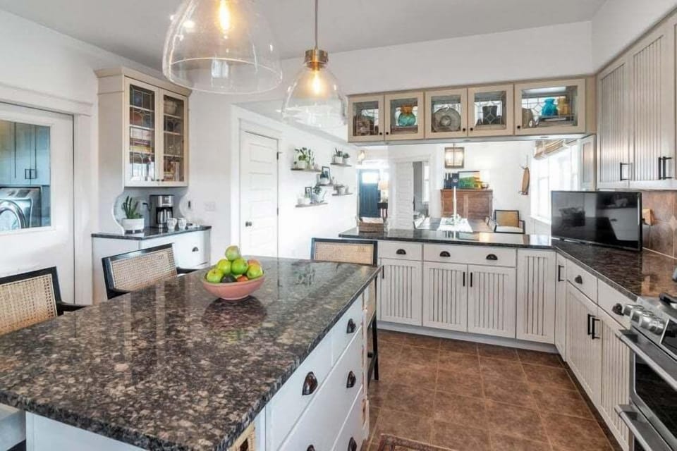 Chef inspired cooking and entertaining full size kitchen with stainless steel appliances