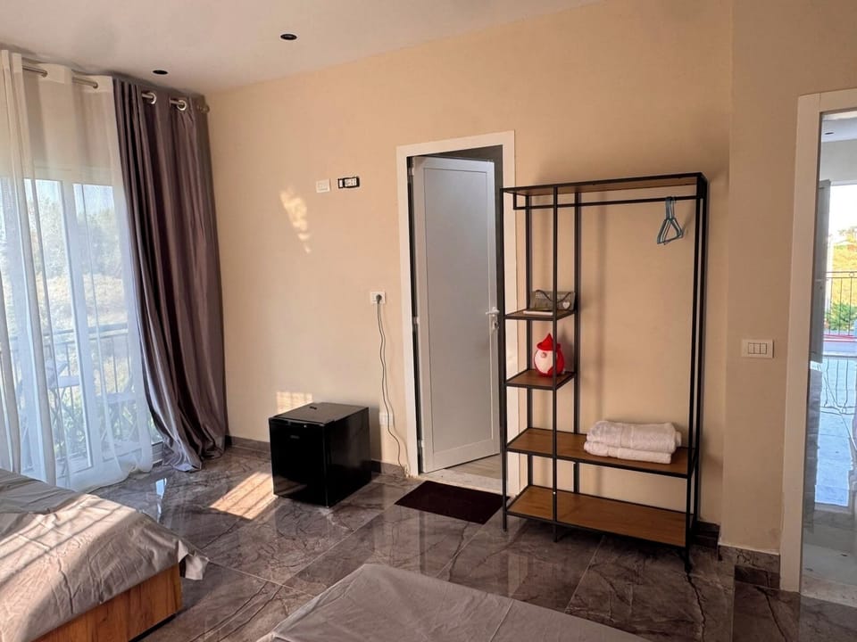 Family Quadruple Room, Balcony, Beach View | Desk, iron/ironing board (on request), WiFi (free)