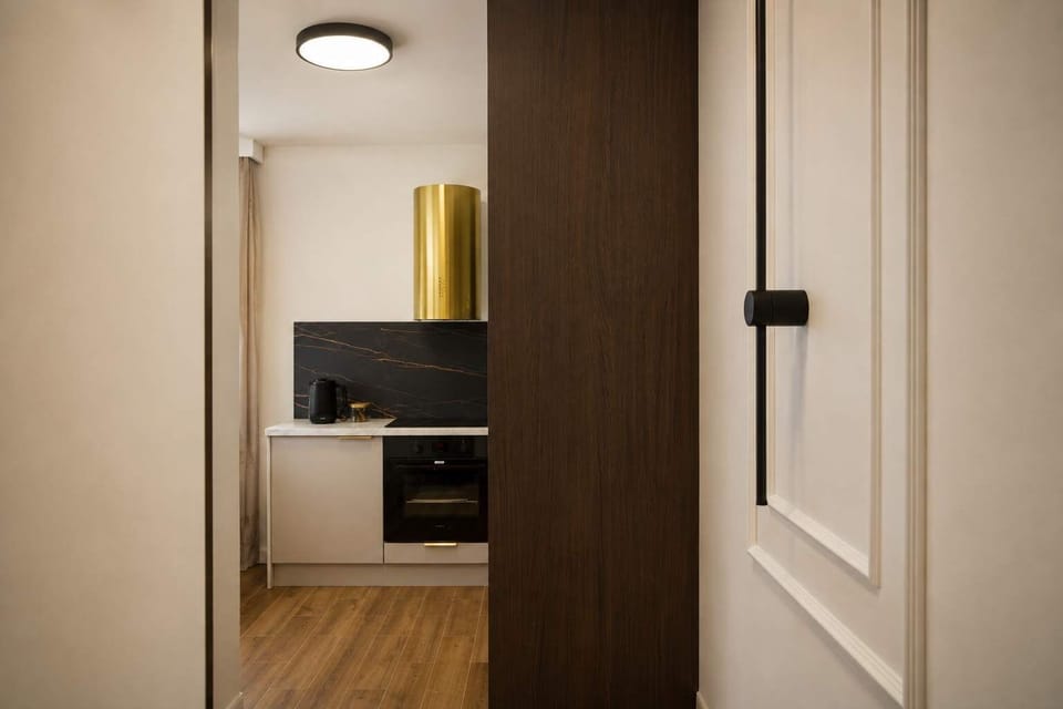 A hallway view towards the living area and kitchenette.