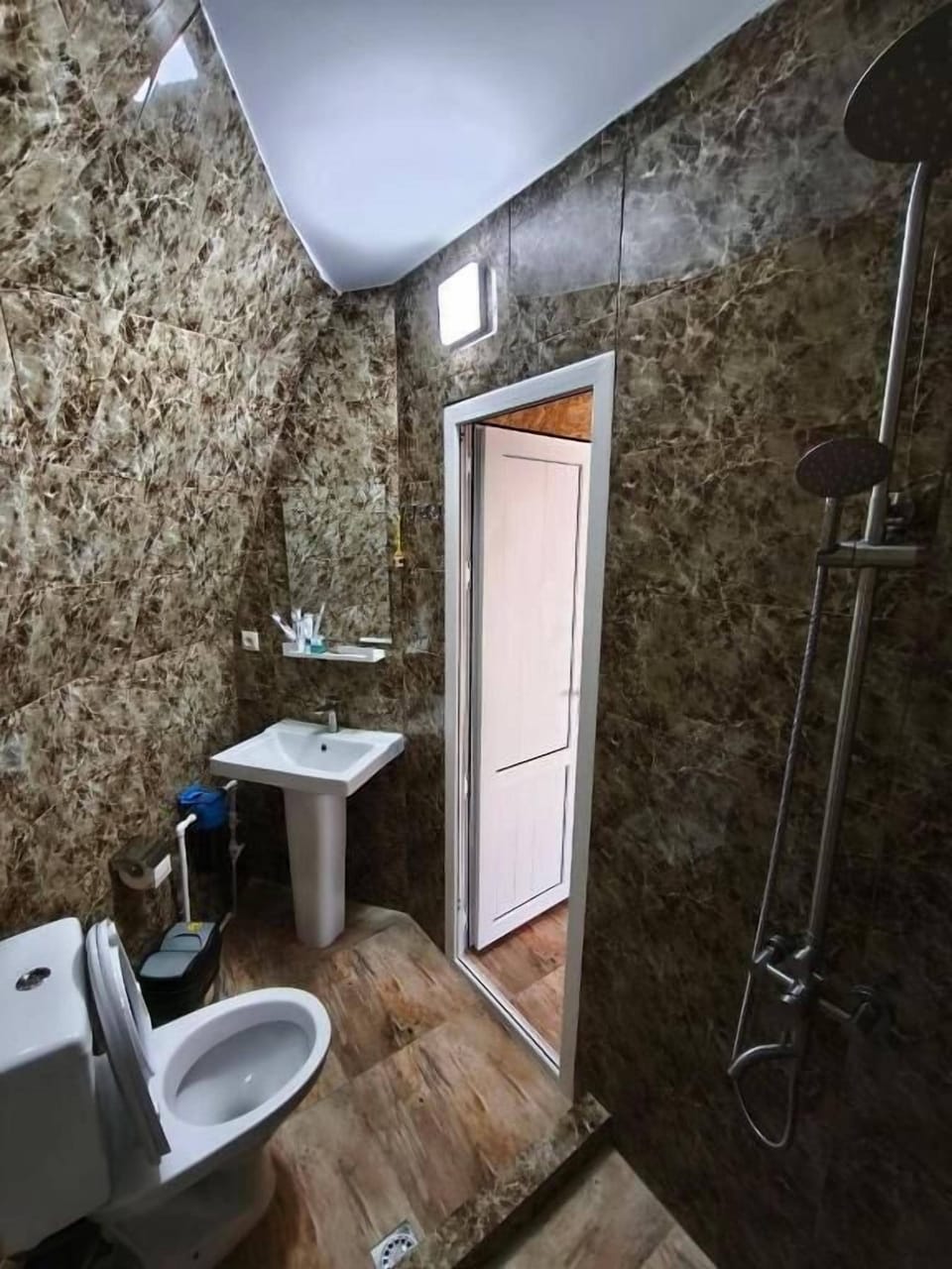 Family Room, Balcony, Mountain View | Bathroom | Hair dryer, slippers, towels