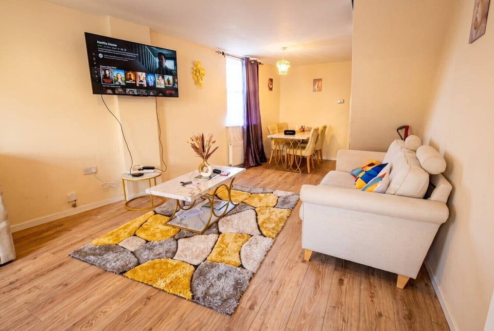 Open lounge flowing into the dining area for shared meals and cosy downtime
