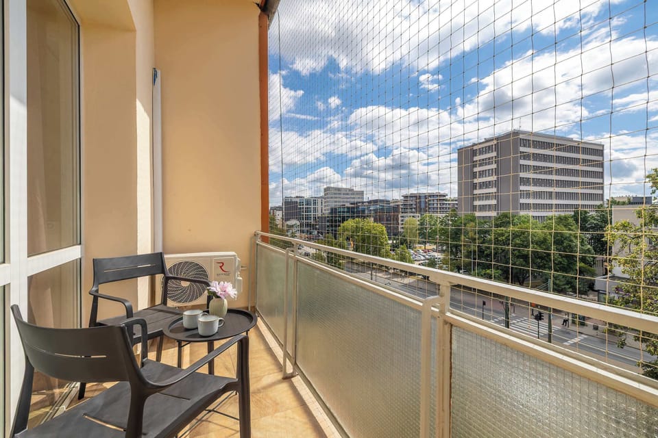 The balcony's peaceful ambiance is ideal for unwinding.