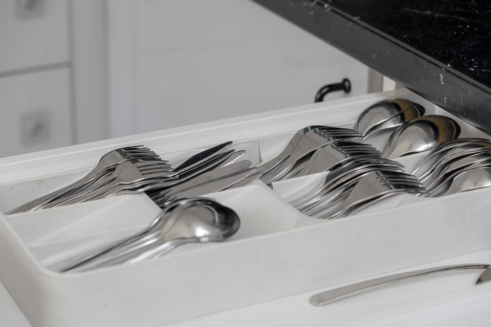The kitchenette is designed to be practical and use space efficiently.