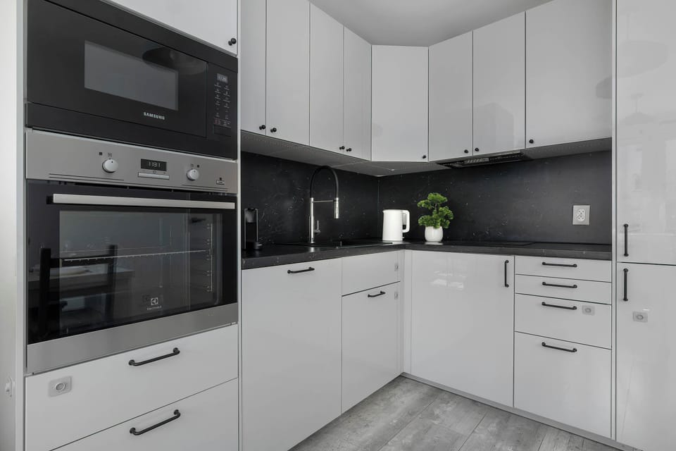 The fully equipped kitchenette includes everything you need for a home-cooked meal.