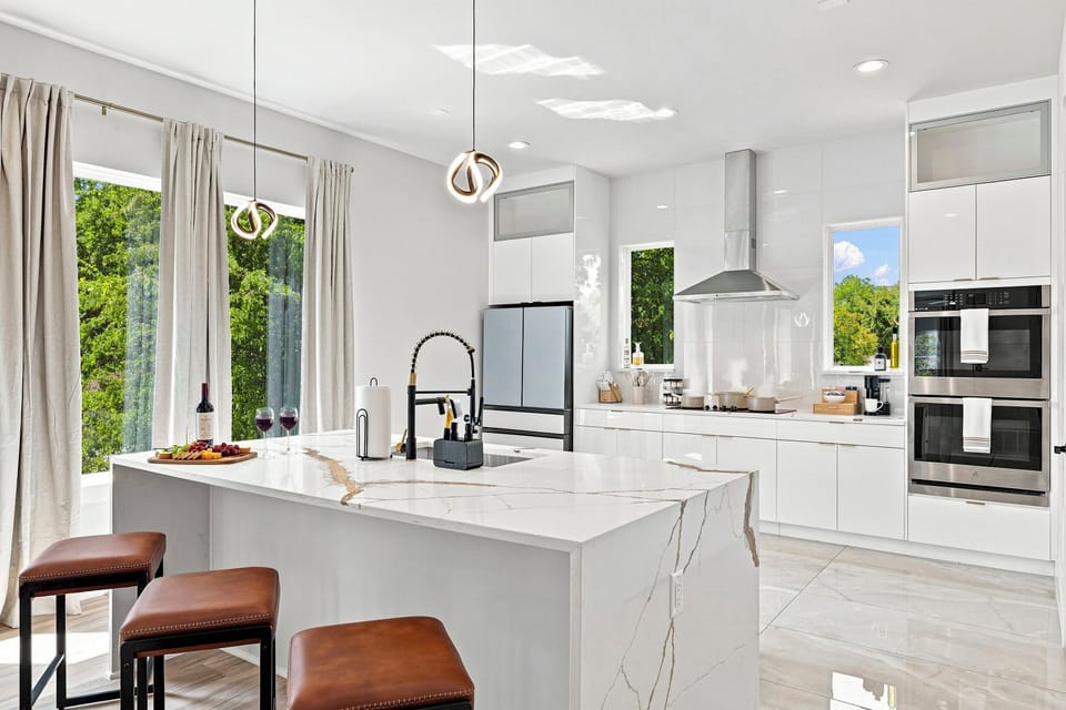Bright and airy space with elegant counters, perfect for culinary adventures!