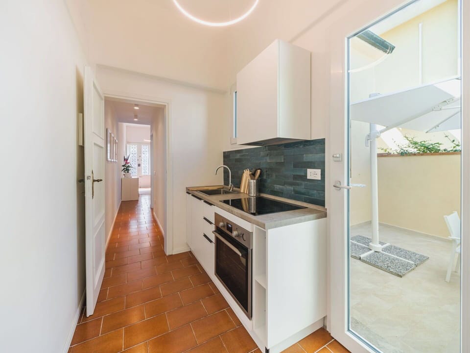 Flooring, Interior Design, Floor, Wood, Ceiling, Countertop, Kitchen, Major Appliance, Kitchen Appliance, Lighting