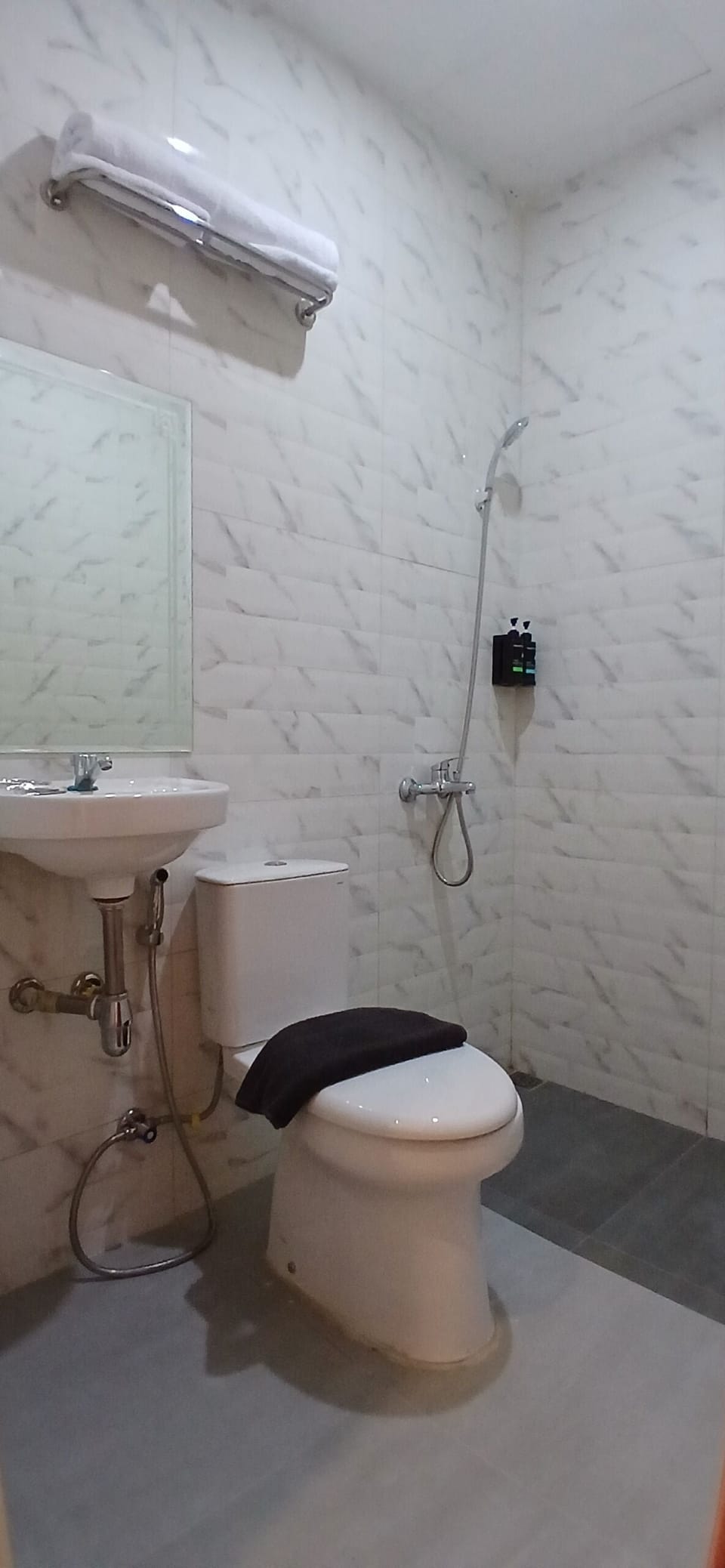 Shower, towels, soap, shampoo