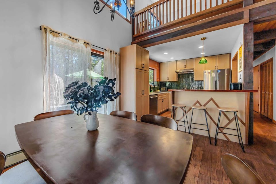 Dining area with deck access, perfect for enjoying meals and relaxing