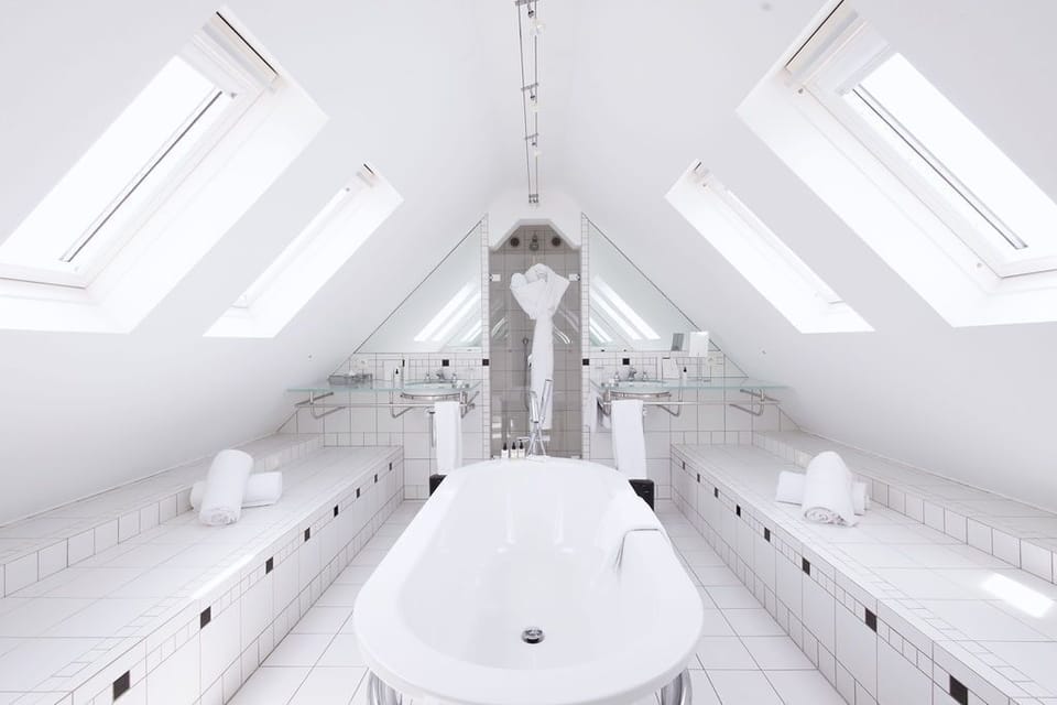 	Family Suite with Spa Access and sea view | Bathroom | Designer toiletries, hair dryer, bathrobes, slippers