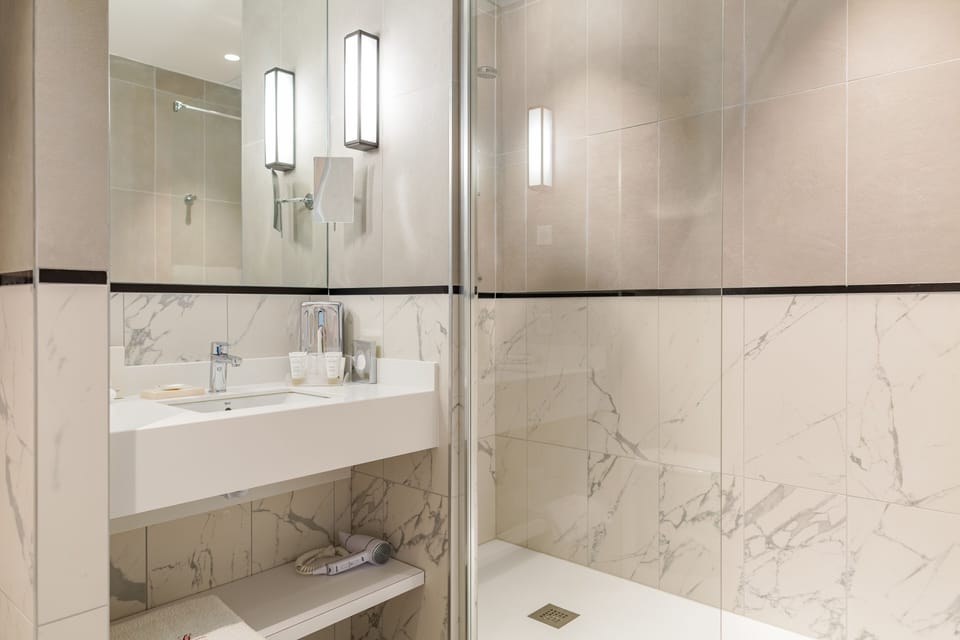 Eco-friendly toiletries, hair dryer, towels, soap