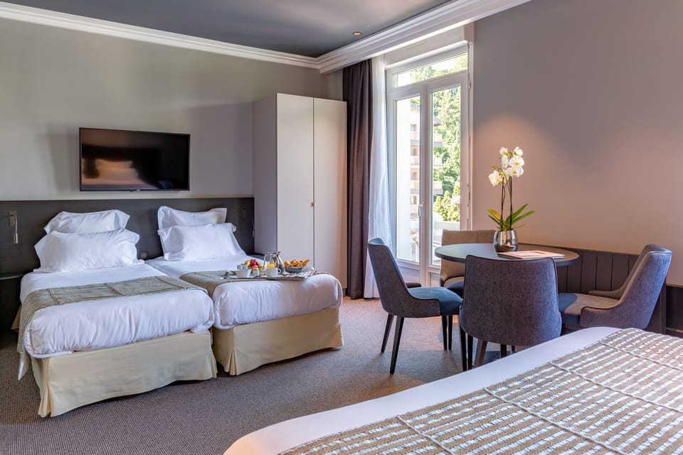 Quadruple Room | In-room safe, individually decorated, individually furnished, desk