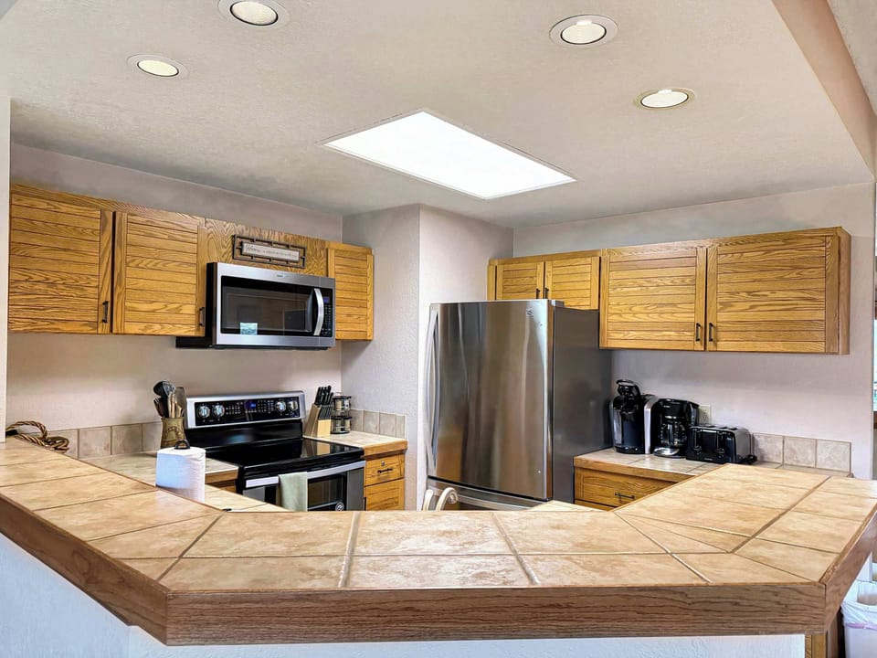 Bar top and well stocked kitchen | Listed with @BookTraverse