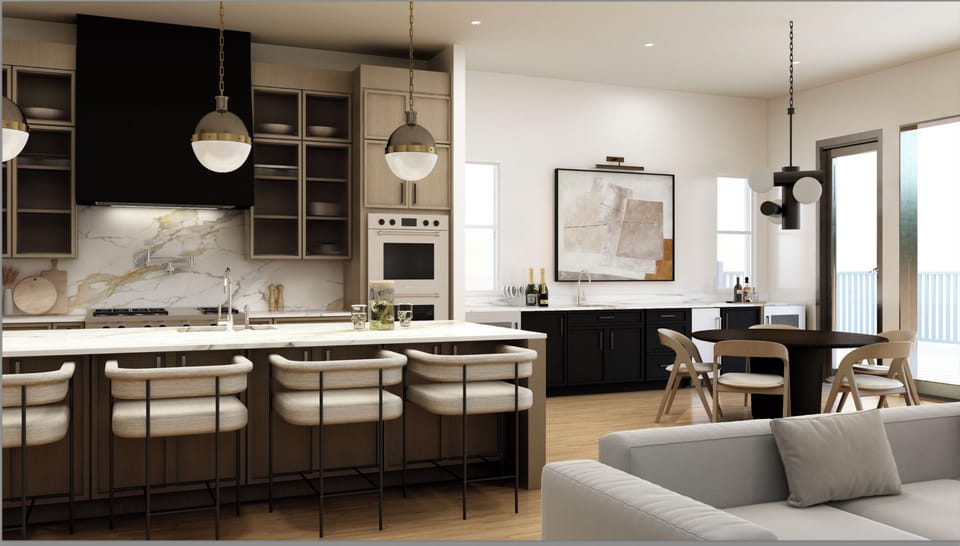Gather around the island for morning coffee or share a meal at the dining table in this modern, open-plan living space designed for easy entertaining.