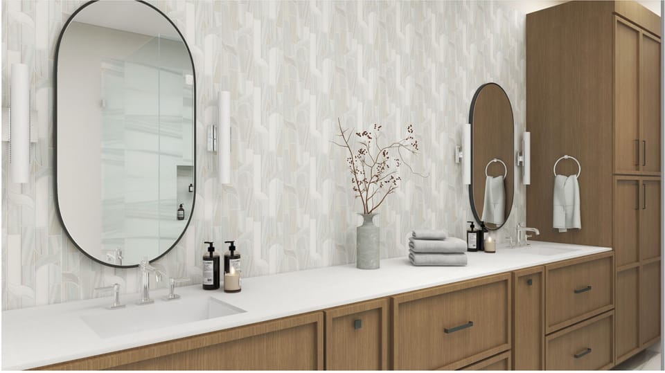 Refresh in your serene dual-vanity bathroom with warm wood cabinetry, elegant mirrors, and a soothing textured backdrop that wraps you in calm sophistication.