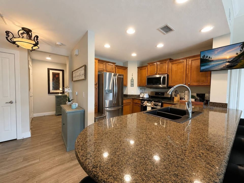 Fully equipped kitchen with stainless steel appliances