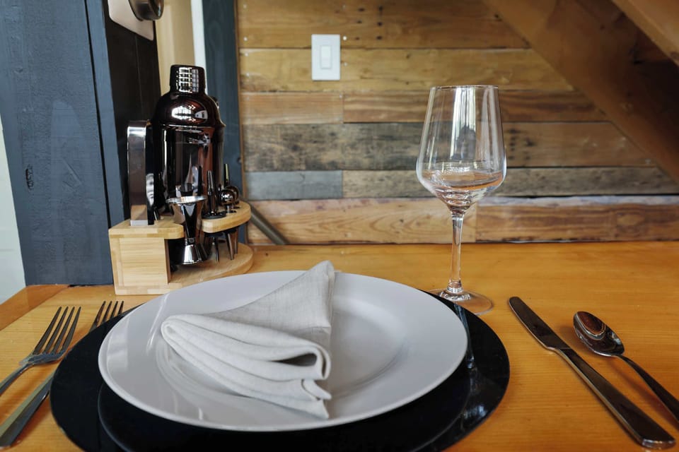 Thoughtful little details, like a properly set table, make this place feel less like a rental and more like a home away from home.