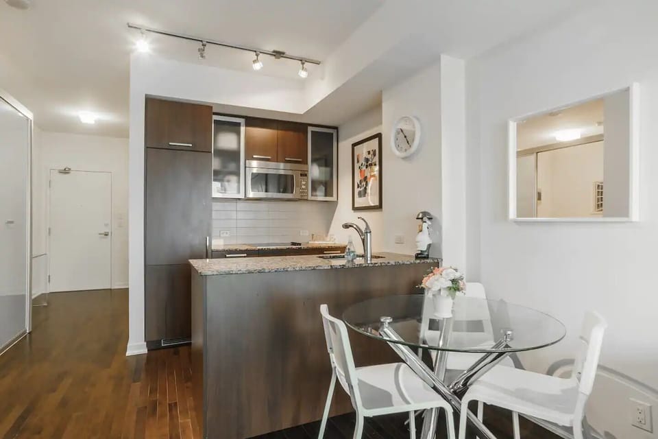 Deluxe Room, Balcony, City View | Private kitchen | Fridge, microwave, oven, stovetop