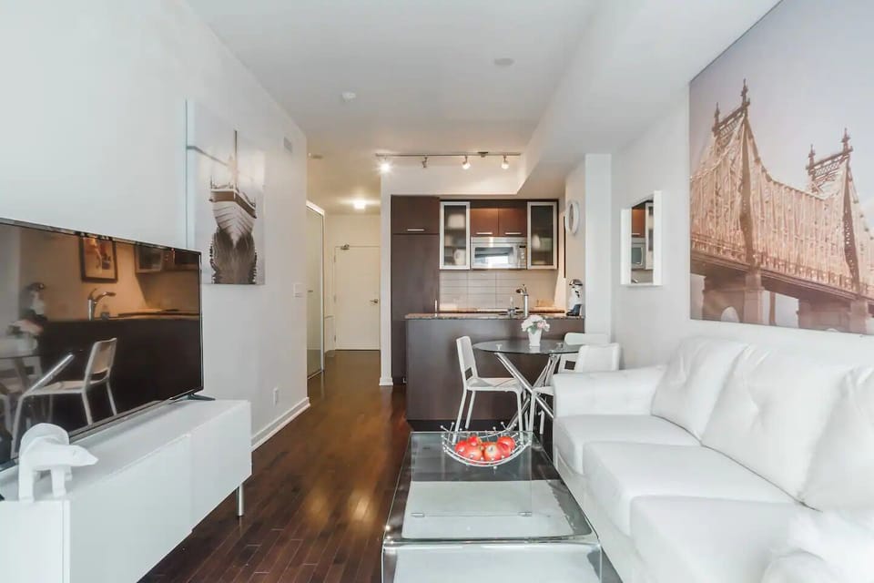 Deluxe Room, Balcony, City View | Living area