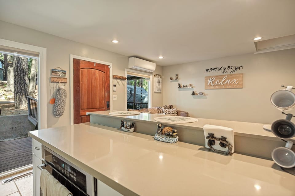 Bright open kitchen with cozy cabin charm and inviting living space