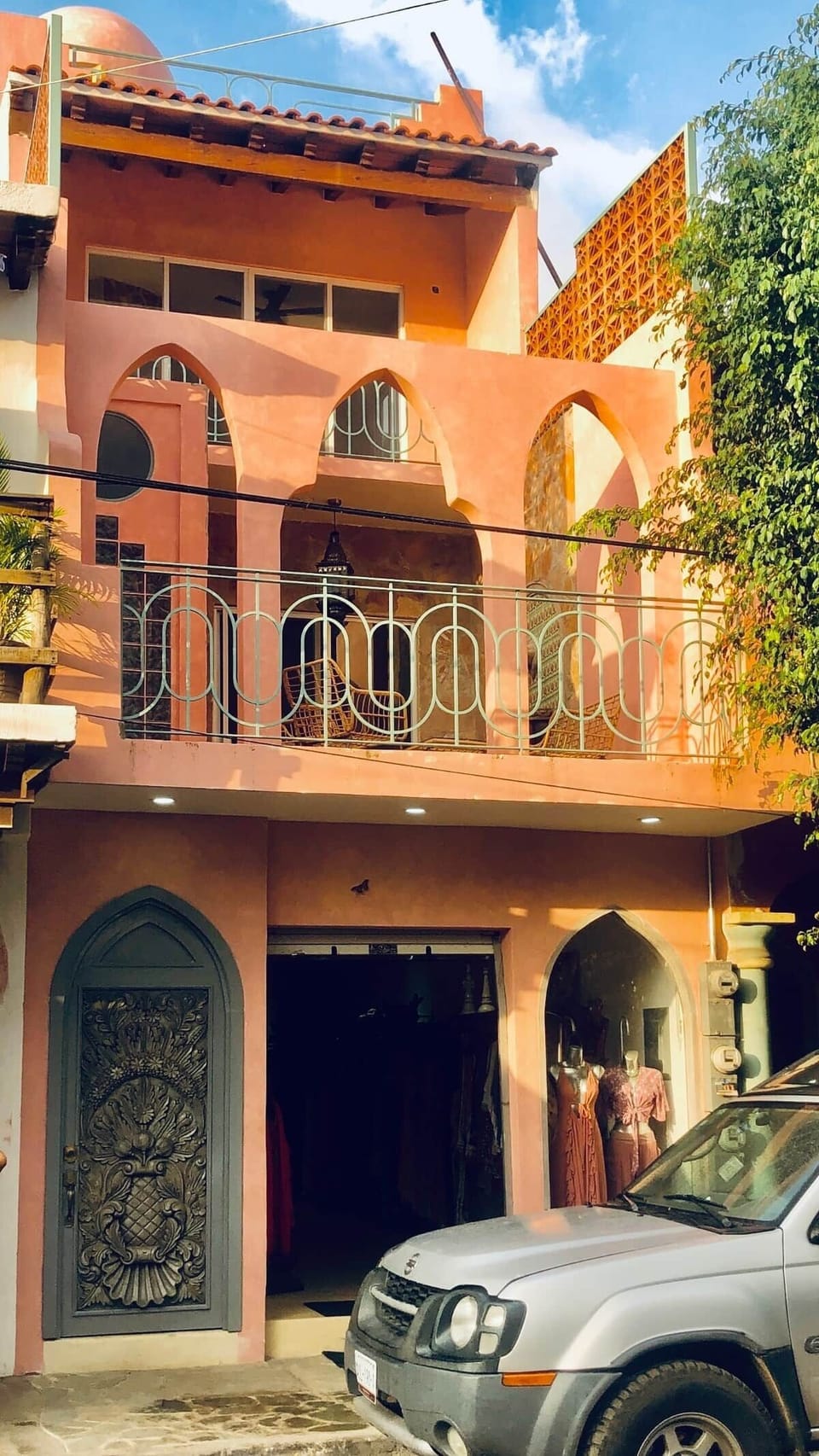 Building from the street.  You enter the apartments thru the beautifully carved door.  Our shop is open below from 9 am to 9 pm.  