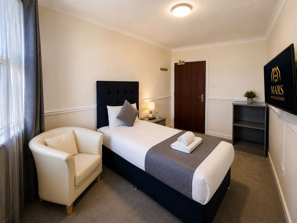 Standard Single Room | Blackout drapes, soundproofing, iron/ironing board (on request)