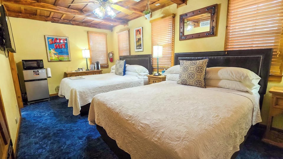 Condo, Multiple Beds, Kitchen, Garden View (Shiner Suite) | 1 bedroom, individually decorated, individually furnished