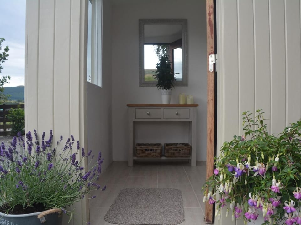 Entering this stylish detached charming cottage